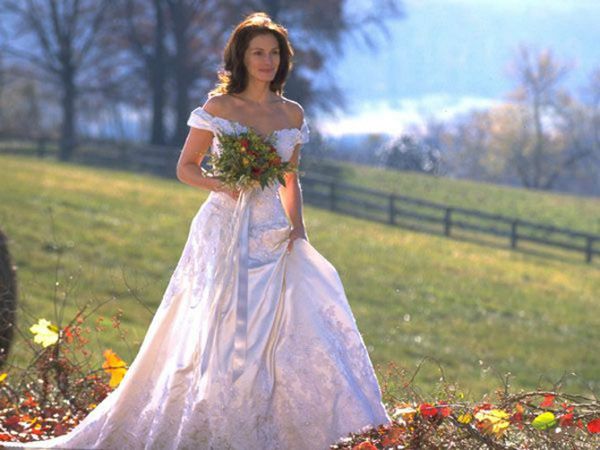 <p>Maggie’s dress in <em>Runaway Bride </em>was just big and pretty enough to distract wedding goers from noticing that she’s probably wearing sneakers underneath that skirt. Hey, when a girl’s gotta dash, a girl’s gotta dash.</p>