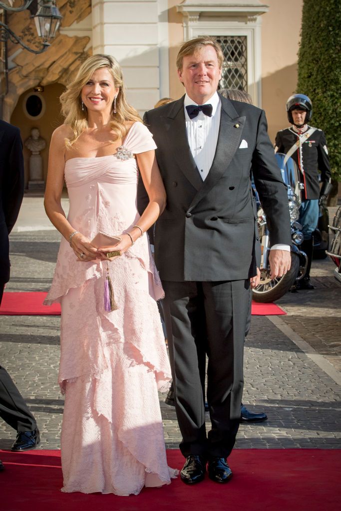 <p>A fan of one-shoulder styles, Maxima wore this tiered pink gown to a concert at the Palazzo Colonna in Rome, Italy. </p>