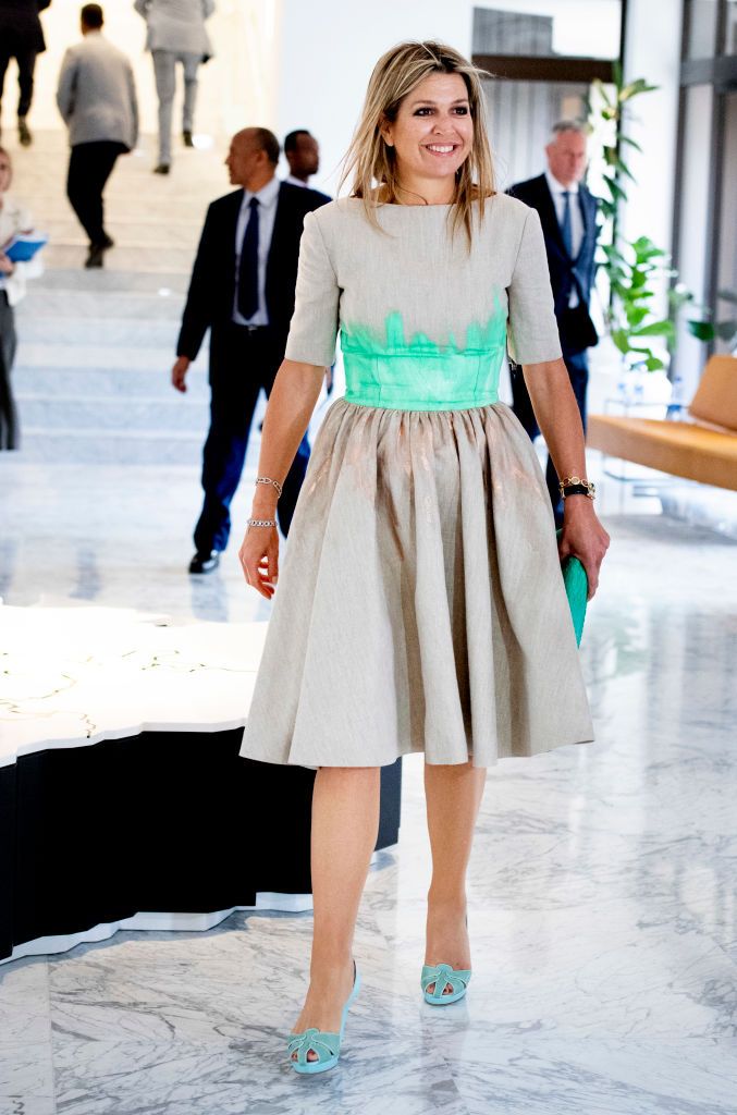 <p>For her visit to Ethiopia in her role as the UN Secretary-General’s Special Advocate for Inclusive Finance for Development, Maxima wore a beige dress with bright turquoise accents at the waist. </p>