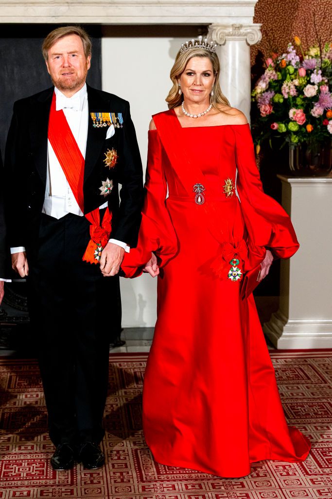 <p>Maxima wore tomato red to host a state banquet in honor of French President Emmanuel Macron and his wife Brigitte Macron at the Royal Palace in Amsterdam.</p>