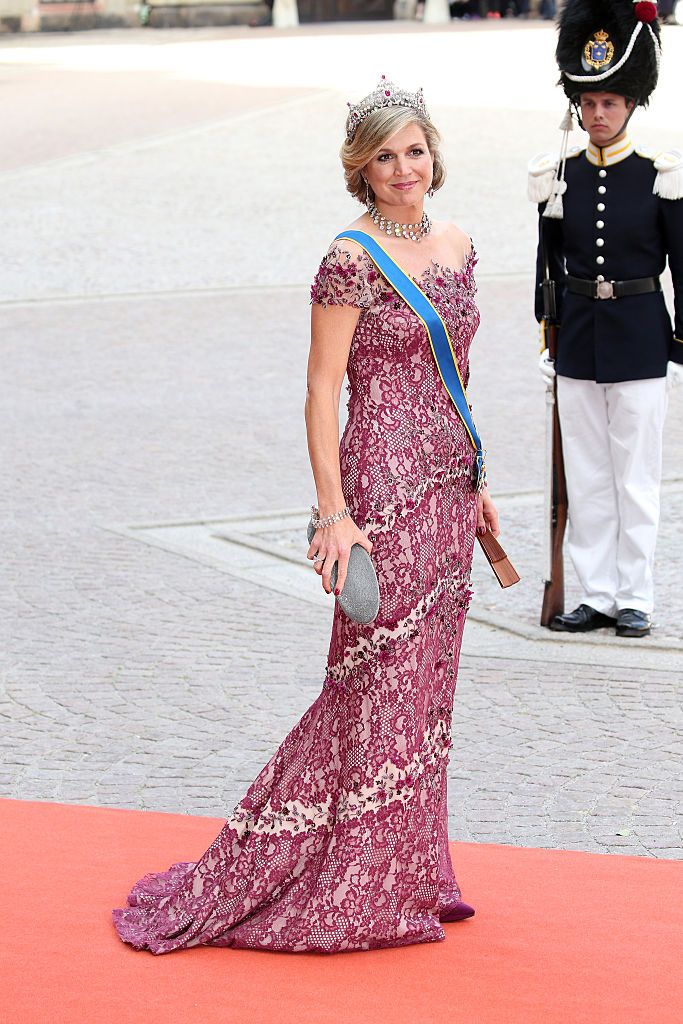 <p>Maxmia went for an off-the-shoulder red lace gown and coordinating gem-encrusted tiara for the royal wedding of Prince Carl Philip of Sweden and Sofia Hellqvist at The Royal Palace in Stockholm.</p>