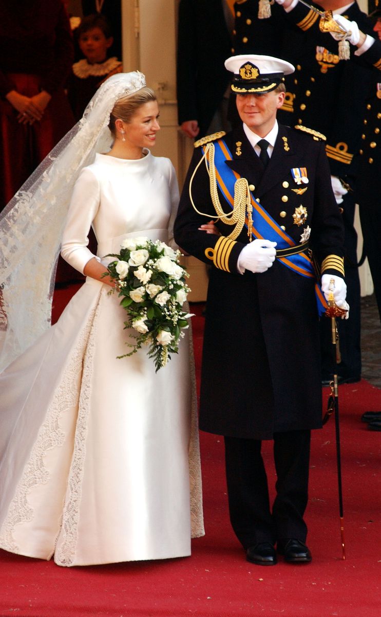<p>Maxima was a blushing bride in a high-collared white gown for her wedding to then-Crown Prince Willem-Alexander in Amsterdam. </p>