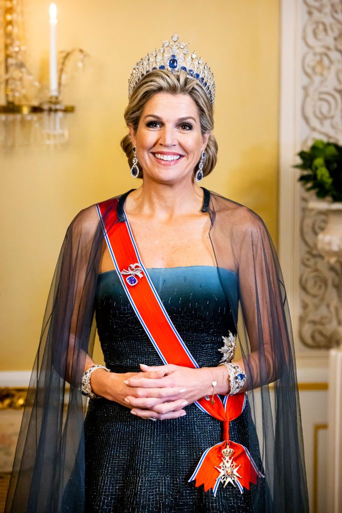 <p>Queen Maxima has proven herself a fan of this sapphire tiara over the years—here, she wore it for a state banquet in the Royal Palace in Oslo along with a sleeveless blue gown and sheer cape. </p>