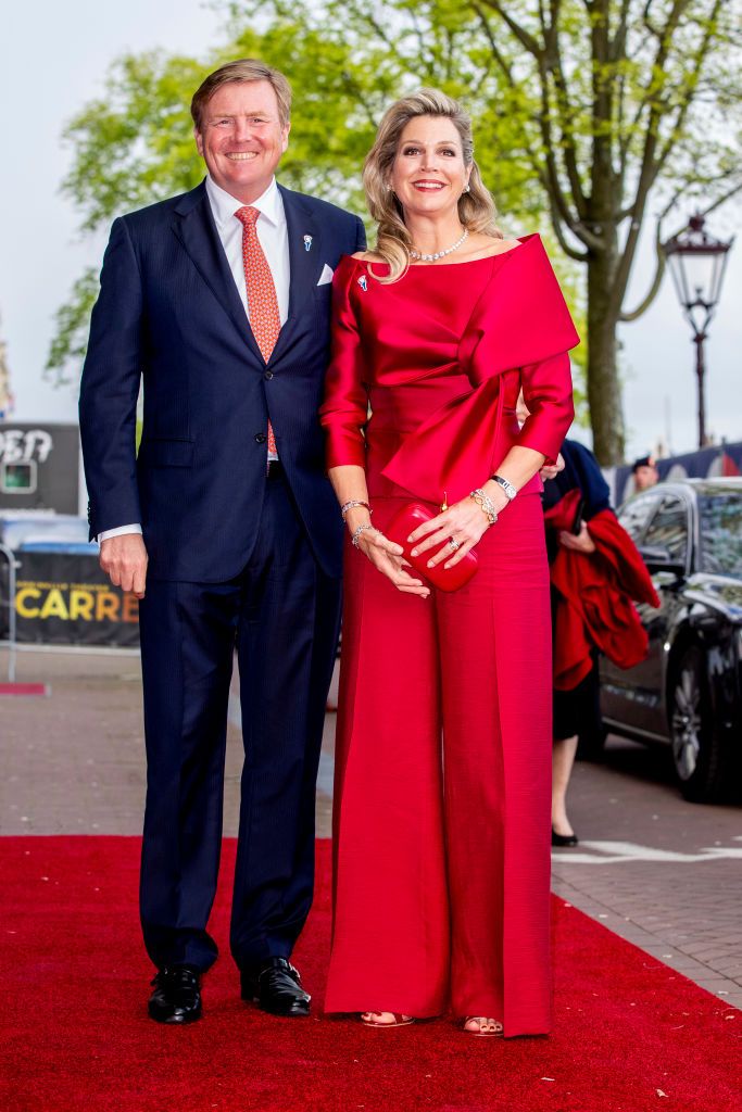 <p>Maxima went for a regal red jumpsuit at the liberation day concert on the Amstel River in Amsterdam.</p>
