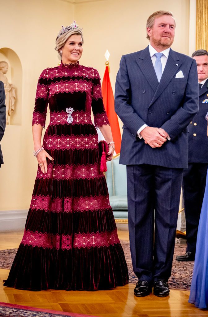 <p>Maxima was ahead of the curve on the knit trend with this artfully lacy striped burgundy ballgown that she wore to a state banquet during the Dutch state visit to Greece.</p>
