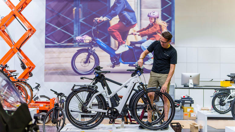 An e-bike being prepared for display at the Eurobike bicycle trade show in Frankfurt, Germany, in June. Andreas Arnold / picture alliance via Getty Images