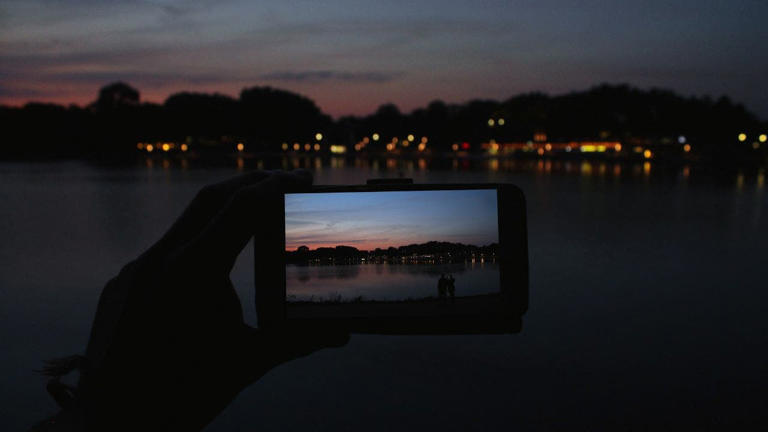 Use something to stabilize your phone. The most important thing to do when taking pictures at night is to keep the phone camera still. Kurt Knutsson