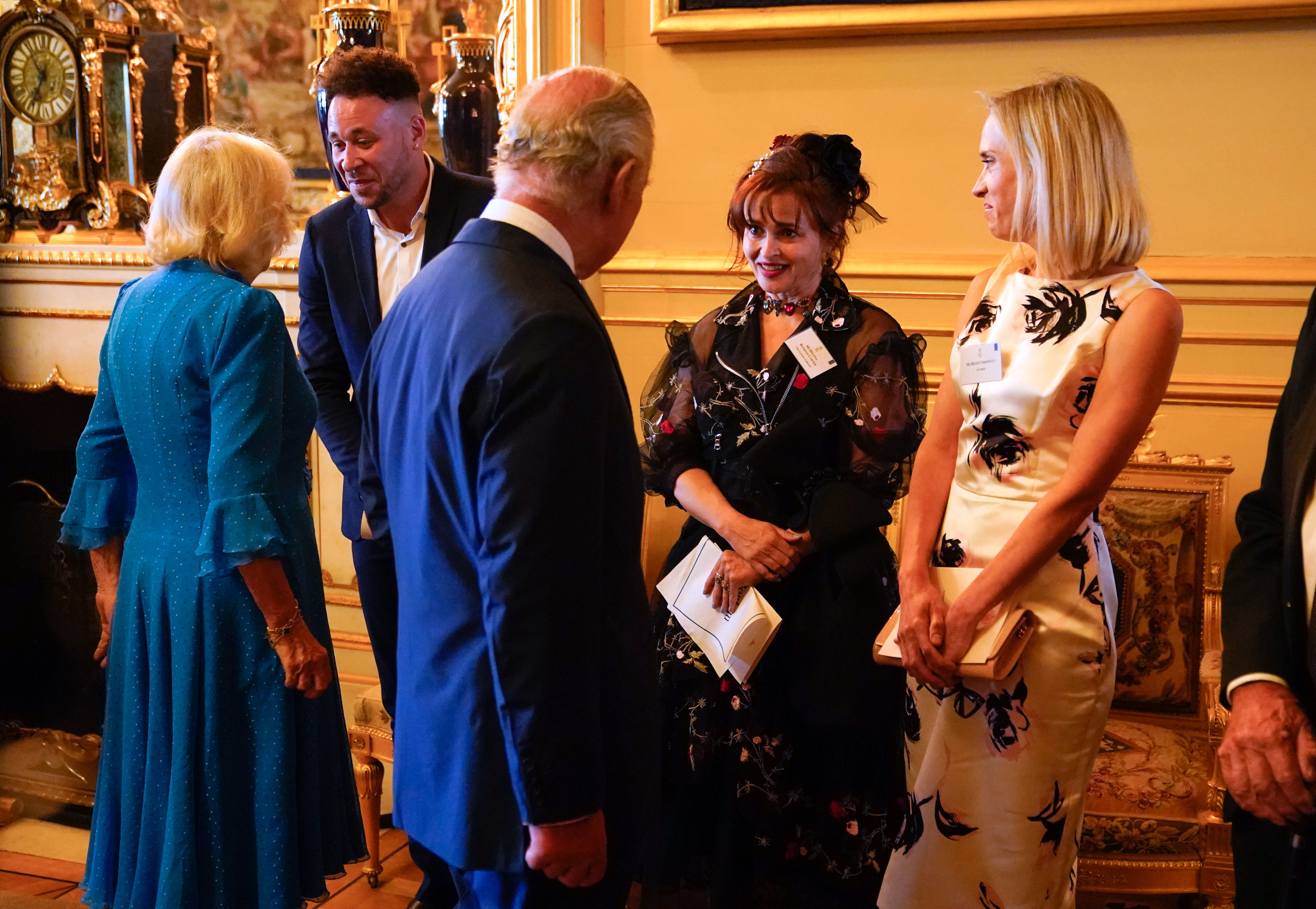 <p>King Charles III met with actress Helena Bonham Carter -- who played his aunt, Princess Margaret, on "The Crown" -- during a reception at Windsor Castle in WIndsor, England, on July 18, 2023, to celebrate the work of William Shakespeare on the 400th anniversary of the publication of the first Shakespeare Folio.</p>