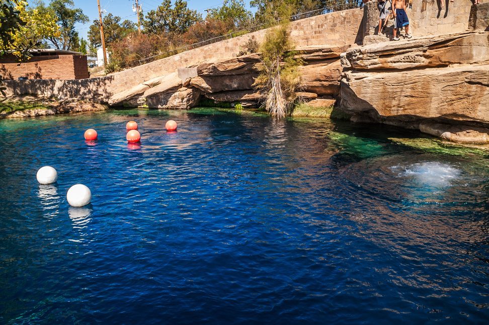 <p><a href="https://www.tripadvisor.com/Attraction_Review-g47206-d265265-Reviews-Blue_Hole-Santa_Rosa_New_Mexico.html" rel="noopener">This blue gem</a> is smack in the middle of the desert and offers swimming, snorkeling and diving in 64-degree water. The crystal-clear spring is home to various fish species and is open daily. Check out <a href="https://www.rd.com/list/best-family-travel-destinations-by-state/">these other family travel destinations</a> too.</p> <p class="listicle-page__cta-button-shop"><a class="shop-btn" href="https://www.tripadvisor.com/Attraction_Review-g47206-d265265-Reviews-Blue_Hole-Santa_Rosa_New_Mexico.html">Learn More</a></p>