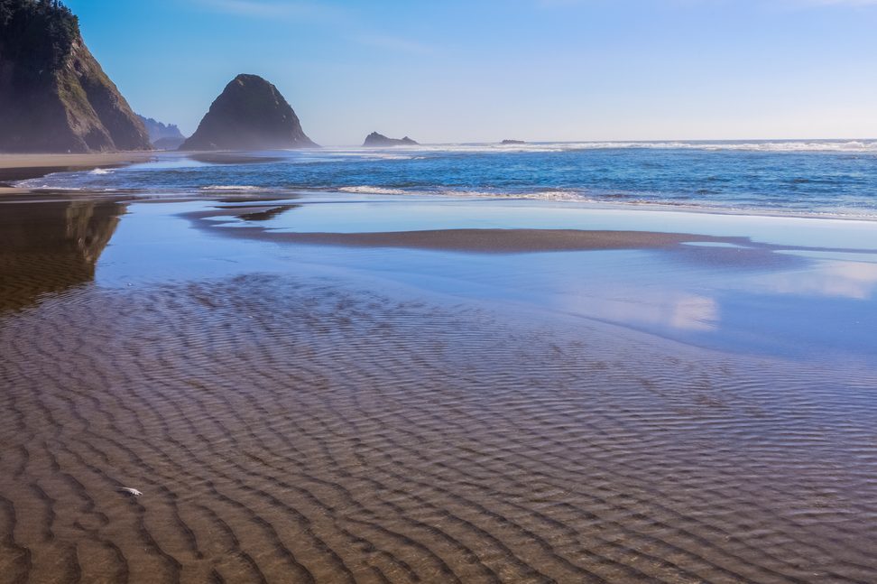 <p>Native Oregonian Lance Marrs, a principal broker at Living Room Realty in Portland, told <em>Reader's Digest</em> about this "<a href="https://www.tripadvisor.com/Tourism-g29995-Arch_Cape_Oregon-Vacations.html" rel="noopener">gem on the Oregon Coast</a>." It's a mostly deserted beach, with tide pools, a small waterfall and caves. At low tide, you can walk on the old road from the 1900s, which was carved out of the cliffs at Hug Point. The name comes from the fact that stagecoaches had to "hug" the side of the rocks to avoid the waves and the steep cliffs.</p> <p class="listicle-page__cta-button-shop"><a class="shop-btn" href="https://www.tripadvisor.com/Tourism-g29995-Arch_Cape_Oregon-Vacations.html">Learn More</a></p>