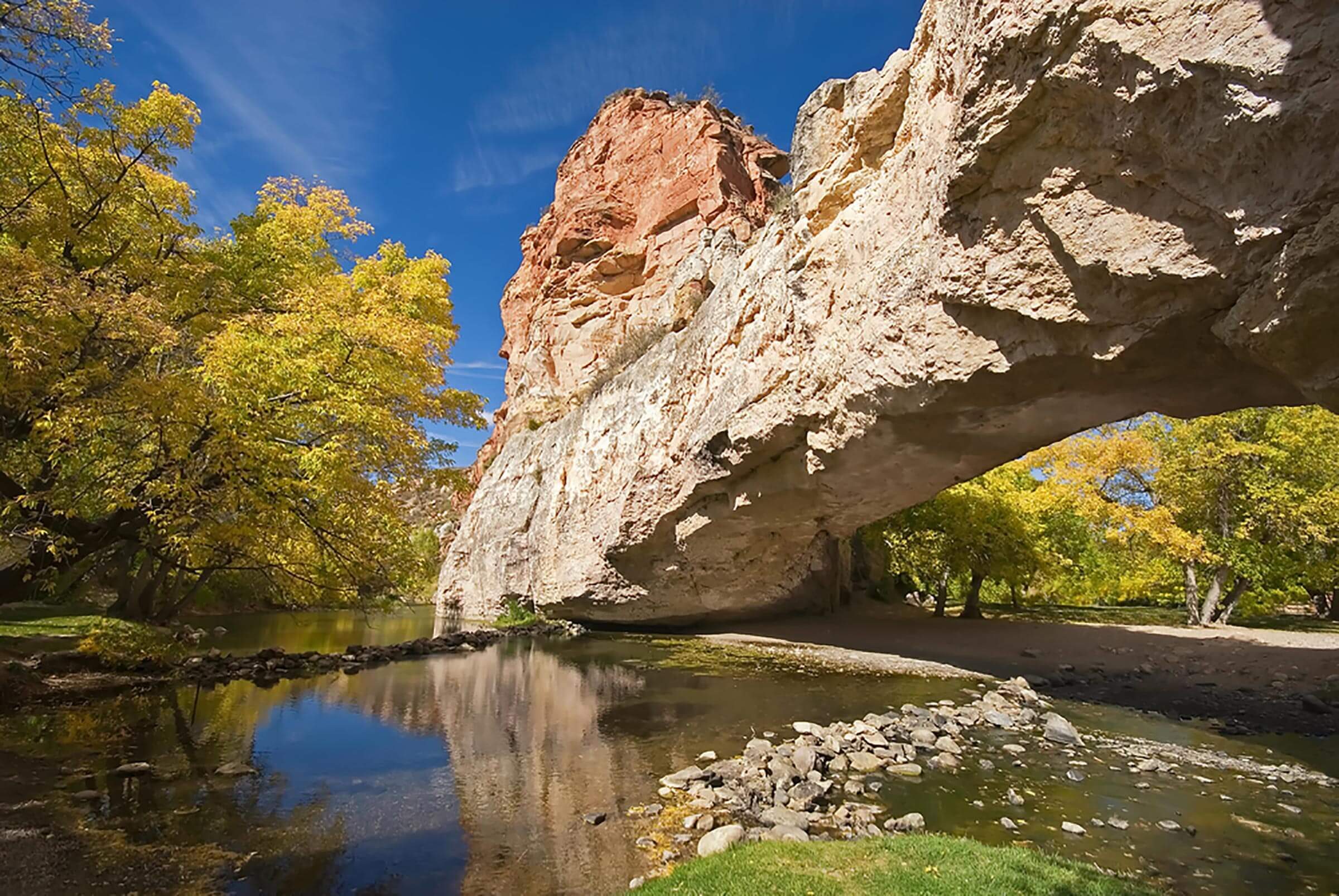 <p>"Some people might make the case that Wyoming itself is off the beaten path," says Jayme Sandberg of the American Heart Association, who used to live in the state. Sandberg wanted <em>Reader's Digest</em> to know about <a href="https://www.tripadvisor.com/Attraction_Review-g60452-d1086063-Reviews-Ayres_Natural_Bridge-Douglas_Wyoming.html" rel="noopener">Ayres Natural Bridge</a>, a place of natural beauty where over the course of millions of years, a creek wore away at a rock wall, carving out a natural bridge. Because it's challenging to access (unless you're adept at driving on dirt roads and narrow paths), it's a hidden gem whose visitors tend to be locals with picnic lunches.</p> <p class="listicle-page__cta-button-shop"><a class="shop-btn" href="https://www.tripadvisor.com/Attraction_Review-g60452-d1086063-Reviews-Ayres_Natural_Bridge-Douglas_Wyoming.html">Learn More</a></p> <p><em>Additional reporting by Lauren Cahn</em>.</p> <p><strong>Sources:</strong></p> <ul> <li><a href="https://www.californiabeaches.com/beach/black-sands-beach-marin-headlands/" rel="noopener">California Beaches</a>: "Black Sands Beach"</li> <li><a href="https://www.atlasobscura.com/places/harry-andrews-chateau-laroche" rel="noopener">Atlas Obscura</a>: "Harry Andrews' Chateau Laroche"</li> <li><a href="https://www.funinfairfaxva.com/20-northern-virginia-hidden-gems/" rel="noopener">Fun in Fairfax</a>: "20 Must-See Northern Virginia Hidden Gems Rich in Nature and History"</li> </ul>