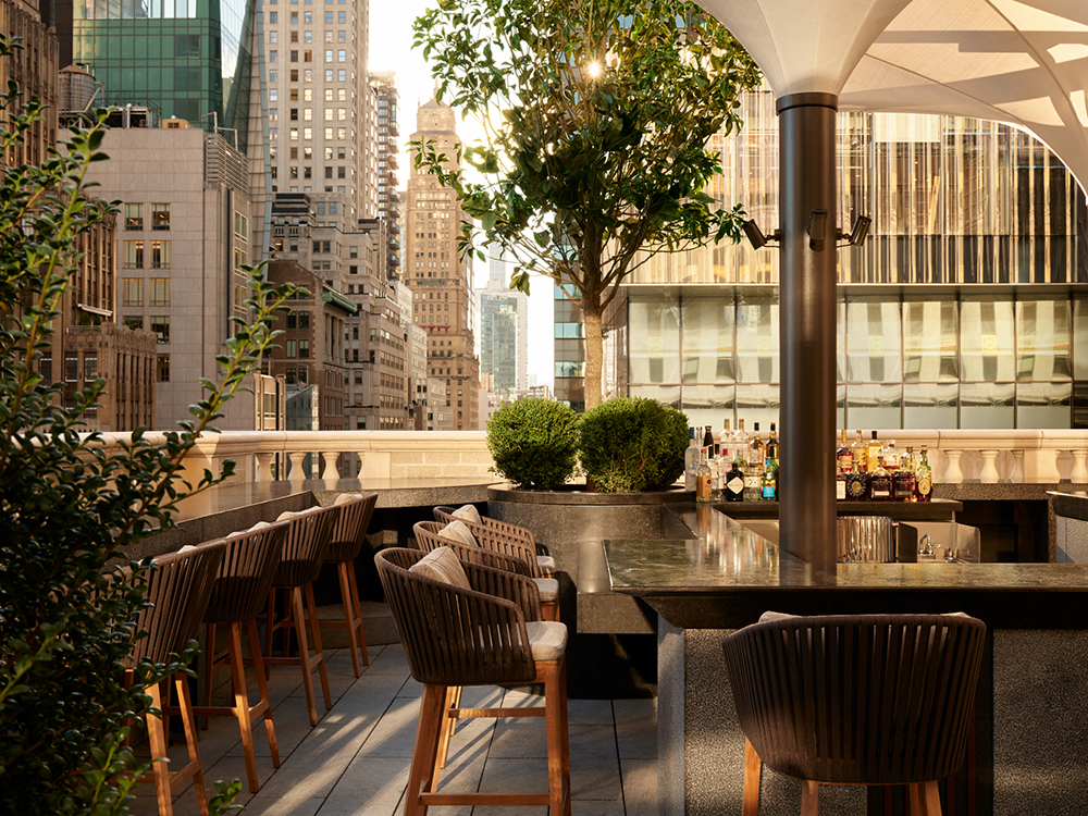 <p>If sanctuary is what you seek, look no further than the eastern-inspired <a href="https://www.aman.com/hotels/aman-new-york">Aman New York</a>. Housed on floors seven through 14 in the 1921 Crown Building, with its signature green and gold embellished turret, the Aman has quickly established itself as an oasis of calm. The hotel opened to acclaim in 2021 after an overhaul by architect Jean-Michel Gathy, drawing inspiration from the company’s southeast Asian properties. The 83 all-suite property features abodes that are among the biggest in the city—up to 2,800 square feet—and feature highlights such fireplaces, soaking tubs, and steam showers. You’ll feel transported out of the city with a visit to Nama, a restaurant exclusive to hotel guests, which serves up Japanese washoku cuisine—dine in either the indoor karesansui rock garden, or on the outdoor terrace. Or take a personal wellness journey in a Spa House, with Hammam or Banya that has its own treatment room, living area, and terrace, complete with hot bath and cold-plunge pool. Canopies allow for year round use, should you wish to brave the New York winter chill.</p> <p><em>Prices from $1,750</em></p>