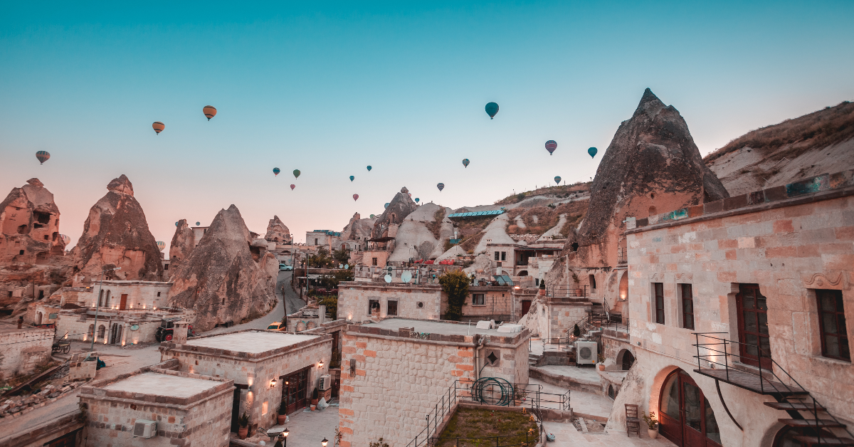 <p> In the heartland of Turkey is the otherworldly landscape of Cappadocia. Known for its fairy chimneys, Cappadocia’s landscape features remarkable expanses of volcanic rock shaped by erosion into towers, cones, pinnacles, and caves. </p><p>Although Mother Nature got the ball rolling, humans from thousands of years ago continued the efforts, carving incredible chambers, a church, and tunnel complexes throughout the countryside.</p><p class=""><b>Pro tip: </b>Make sure you take a credit card that helps you <a href="https://financebuzz.com/top-travel-credit-cards?utm_source=msn&utm_medium=feed&synd_slide=5&synd_postid=12626&synd_backlink_title=earn+travel+rewards&synd_backlink_position=5&synd_slug=top-travel-credit-cards">earn travel rewards</a> when you visit so that your money can stretch further. </p>