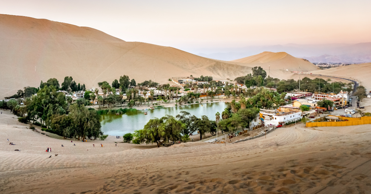 <p> No, it’s not a mirage. Huacachina is the only desert oasis in South America and is a must when traveling to Peru. The small village in the middle of the desert was formed thanks to an underground water stream that allowed plants and trees to grow. </p><p>The oasis sits just 15 minutes away from the city of Ica in southern Peru and five hours south of the capital city of Lima. </p> <p> The village is home to some of the most extensive sand dunes on the continent, which makes it a prime spot for sandboarding and dune buggy rides. Venture to Huacachina, climb one of many dunes and get ready for some of the dreamiest sunsets you’ll ever see.</p><p>  <p><a href="https://financebuzz.com/southwest-booking-secrets-55mp?utm_source=msn&utm_medium=feed&synd_slide=4&synd_postid=12626&synd_backlink_title=7+Nearly+Secret+Things+to+Do+If+You+Fly+Southwest&synd_backlink_position=4&synd_slug=southwest-booking-secrets-55mp">7 Nearly Secret Things to Do If You Fly Southwest</a></p>  </p>