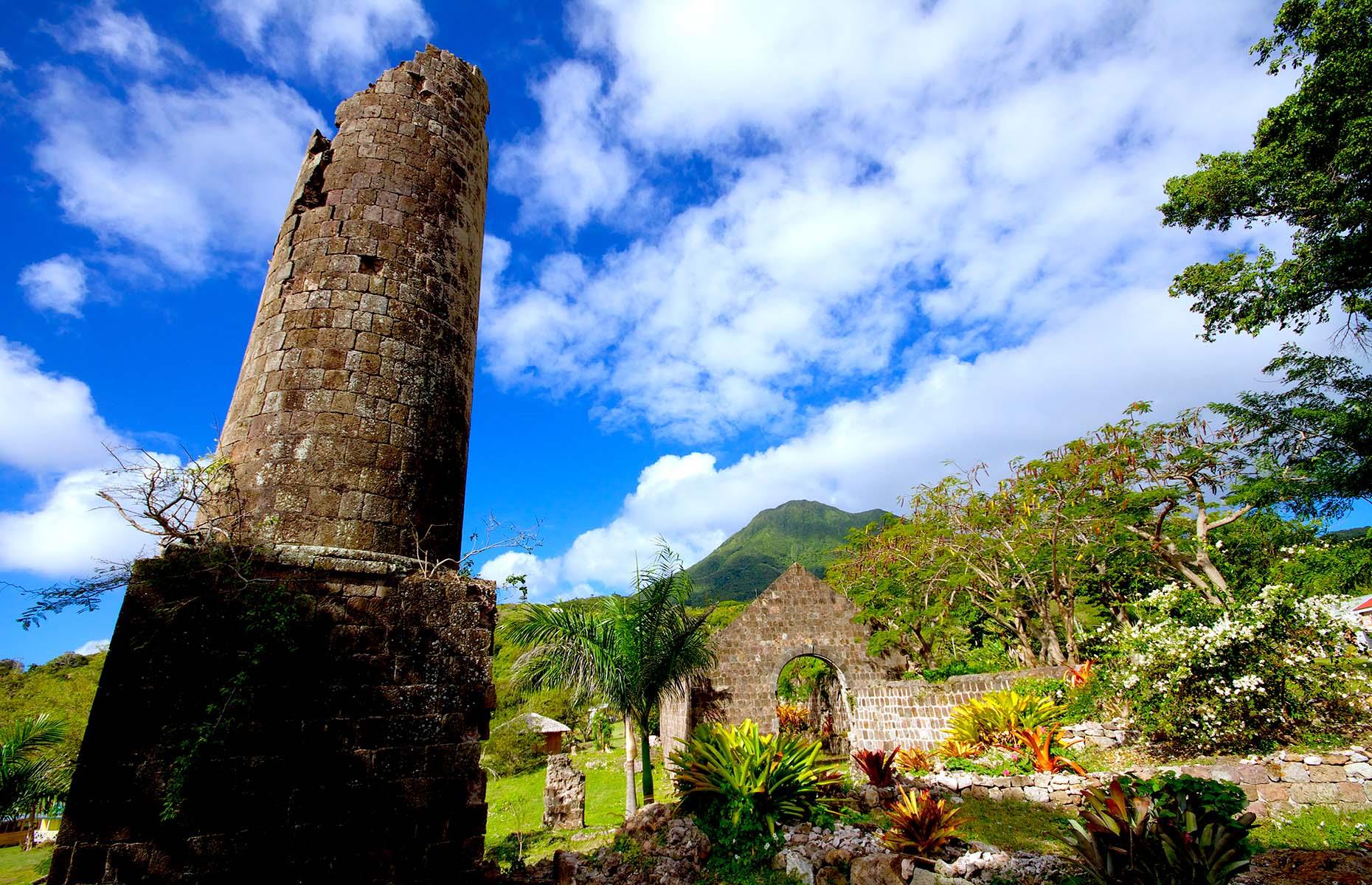 <p>Formerly Fothergill’s Estate – a sugar cane plantation and cotton ginning station – the <a href="https://www.tripadvisor.com/Attraction_Review-g147377-d3531964-Reviews-Nevisian_Heritage_Village_at_Fothergills_Estate-Nevis_St_Kitts_and_Nevis.html">Nevisian Heritage Village</a> is now an open-air museum designed to teach visitors about Nevisian social history, from Carib times to the present day. Exhibits include replica slave houses, a rum shop and a blacksmith’s shop, all of which come complete with period furnishings and offer an insight into the hardship that enslaved Africans had to endure during colonial times. When you’ve finished wandering the buildings, there’s a fabulous on-site café where you can grab a bite to eat.</p>