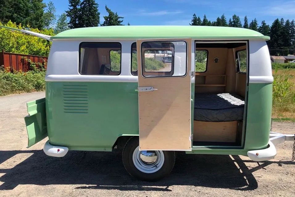 <p>If you're a fan of the VW Bus, you'll love the Dinky Sleeper's design, which looks a lot like the classic vehicle, only in towable form. <a href="https://t2rv.com/">This tiny RV</a> comes with or without an outdoor kitchenette, and both models include a custom queen mattress and options such as privacy window shutters, roof rack, AC/heat, portable cooler, indoor curtain track, and pop-up top with weather curtains.</p><p><a href="https://blog.cheapism.com/coolest-vw-buses/">The Coolest VW Vans Through the Decades</a></p>