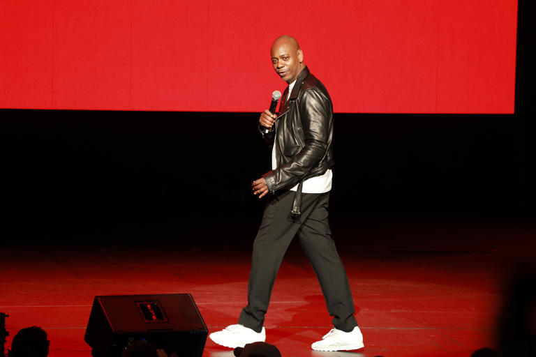 Dave Chappelle performs during a midnight pop-up show at Radio City Music Hall on Oct. 16, 2022, in New York.