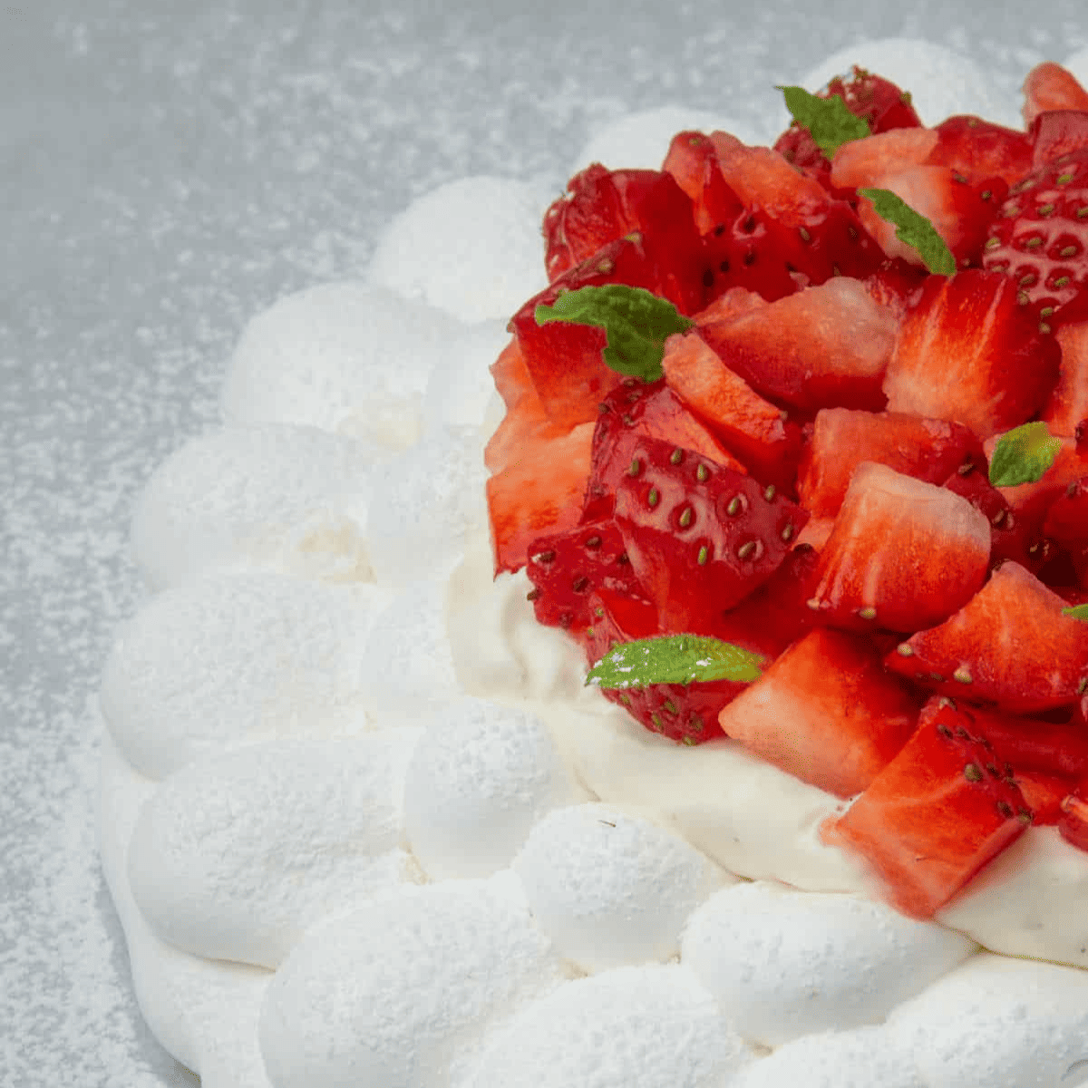 <p>This <strong><a href="https://www.spatuladesserts.com/strawberry-pavlova/#recipe">Strawberry Pavlova</a></strong> cake is the perfect dessert for Spring and Summer, the most amazing Pavlova dessert ever! Crunchy on the outside, marshmallow texture inside, decorated with homemade whipped cream, fresh strawberry, and some mint leaves!</p> <p><strong>Go to the recipe: <a href="https://www.spatuladesserts.com/strawberry-pavlova/#recipe">Strawberry Pavlova</a></strong></p>