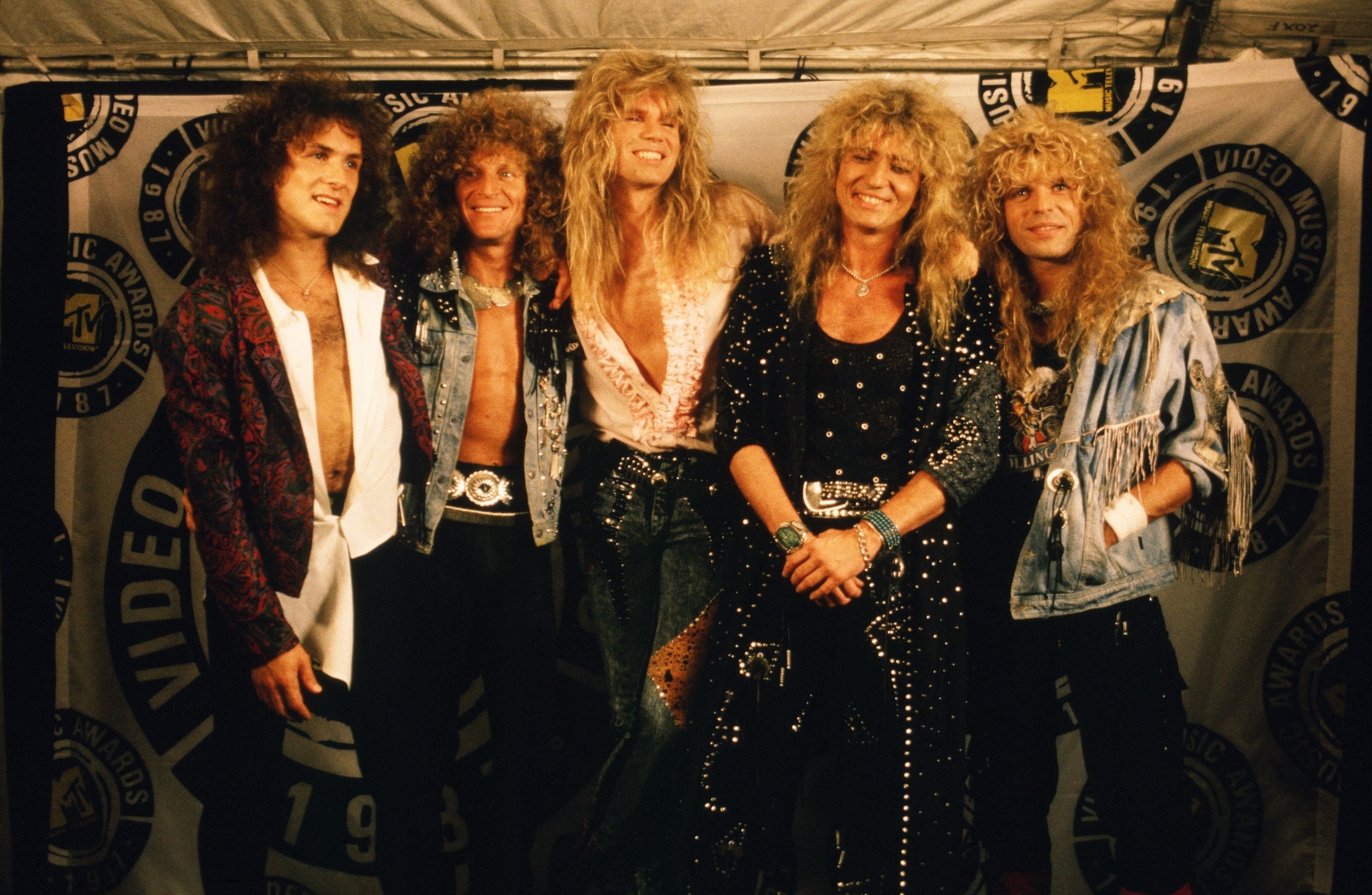 <p>The number of members who have come and gone during Whitesnake's history is bigger than the populations of some small towns. The one consistent has been frontman David Coverdale. The Deep Purple off-shoot offered a bluesy, hard-rock sound in its <a href="https://www.youtube.com/watch?v=tZ1PfB59zf8">early years</a>. However, on the band's <a href="https://www.youtube.com/watch?v=WyF8RHM1OCg">breakout self-titled 1987 release</a>, which featured veteran John Sykes on guitar and '80s hair-metal staples Adrian Vandenberg and, eventually, Rudy Sarzo, its image and overall sound fit in more with the glam metal movement of the day. Also, working with famed A&R exec John Kalodner (Aerosmith, Sammy Hagar, Cher) to make the group a more mainstream commodity can't be understated. </p><p><a href='https://www.msn.com/en-us/community/channel/vid-cj9pqbr0vn9in2b6ddcd8sfgpfq6x6utp44fssrv6mc2gtybw0us'>Did you enjoy this slideshow? Follow us on MSN to see more of our exclusive entertainment content.</a></p>
