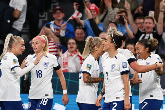 England’s forward #07 Lauren James (R) celebrates with her teammates after scoring her team’s first goal during the Australia and New Zealand 2023 Women’s World Cup Group D football match between England and Denmark at Sydney Football Stadium in Sydney on July 28, 2023. (Photo by DAVID GRAY / AFP) (Photo by DAVID GRAY/AFP via Getty Images)