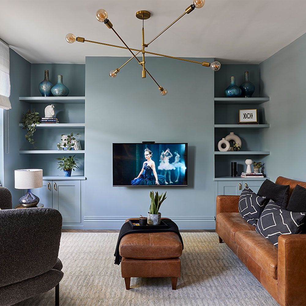 <p>                     Look to a mid-tone blue with grey undertones to keep the look bold but bright. Pair with touches of aged brown leather and brass to welcome an added feeling of warmth. This striking yet understated colour combination creates a sophisticated take on a blue living room idea.                   </p>