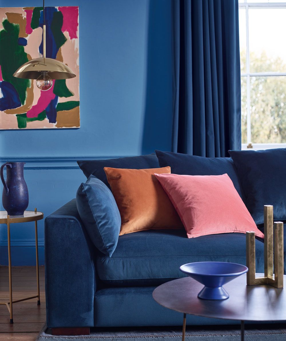 <p>                     For a sophisticated feel, go for mid to dark tones of blue on the wall that will really envelop a room. The deeper the colour, the richer and cosier the effect. Painting skirting and woodwork in the same colour as the walls, creates a smart, seamless finish.                   </p>                                      <p>                     When designing a room in a block colour, it’s important to avoid a flat space, so a velvet sofa and curtains not only create a luxe look, but lift the space with texture and create some depth.                   </p>