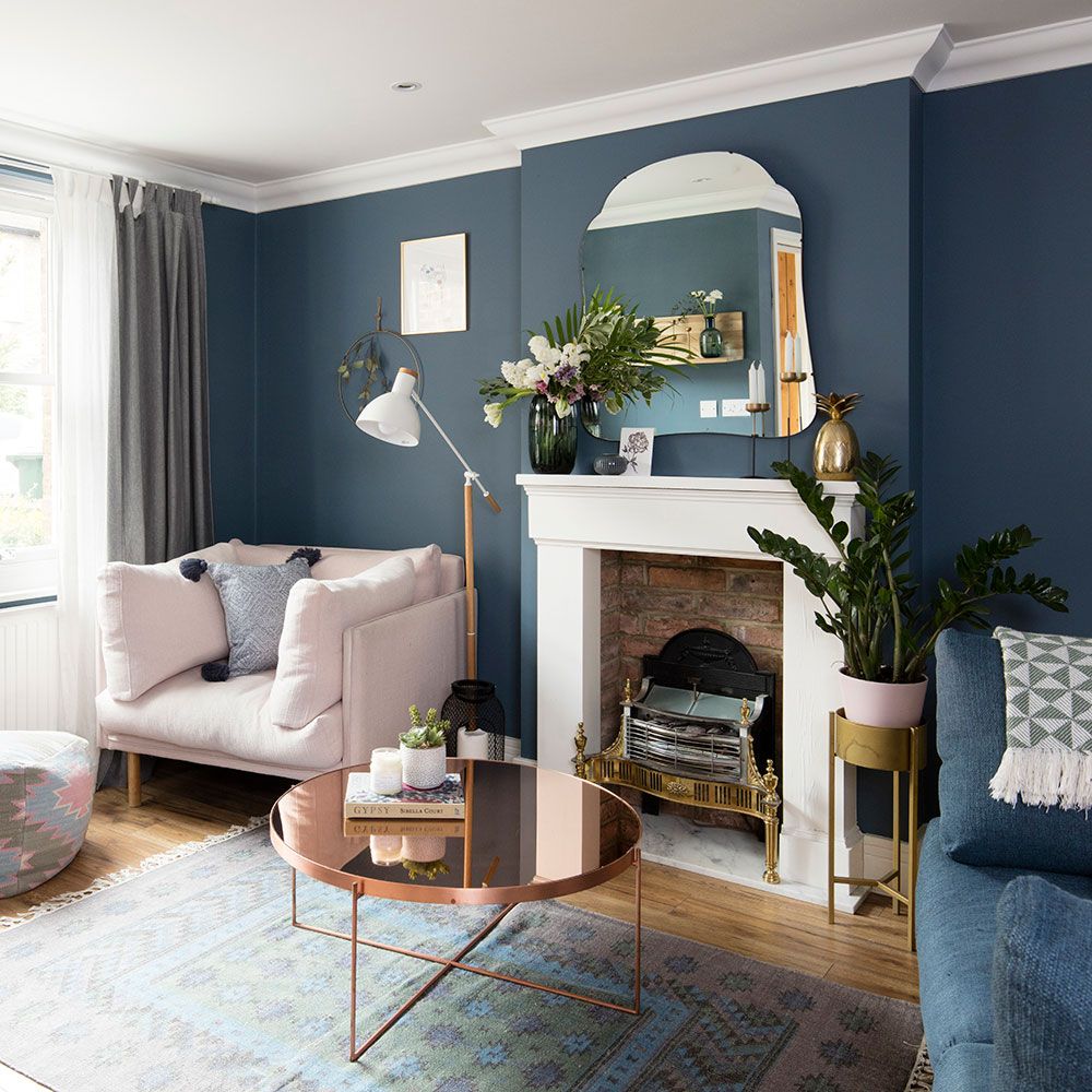 <p>                     Painting the walls a dark blue is a wonderful way to build a look that's cosy and homely. So that the look isn't gloomy, keep the walls, ceilings and window dressings light – ideally white – to balance things. Mirror-finish furniture will also maximise the light in a dark-painted room.                   </p>