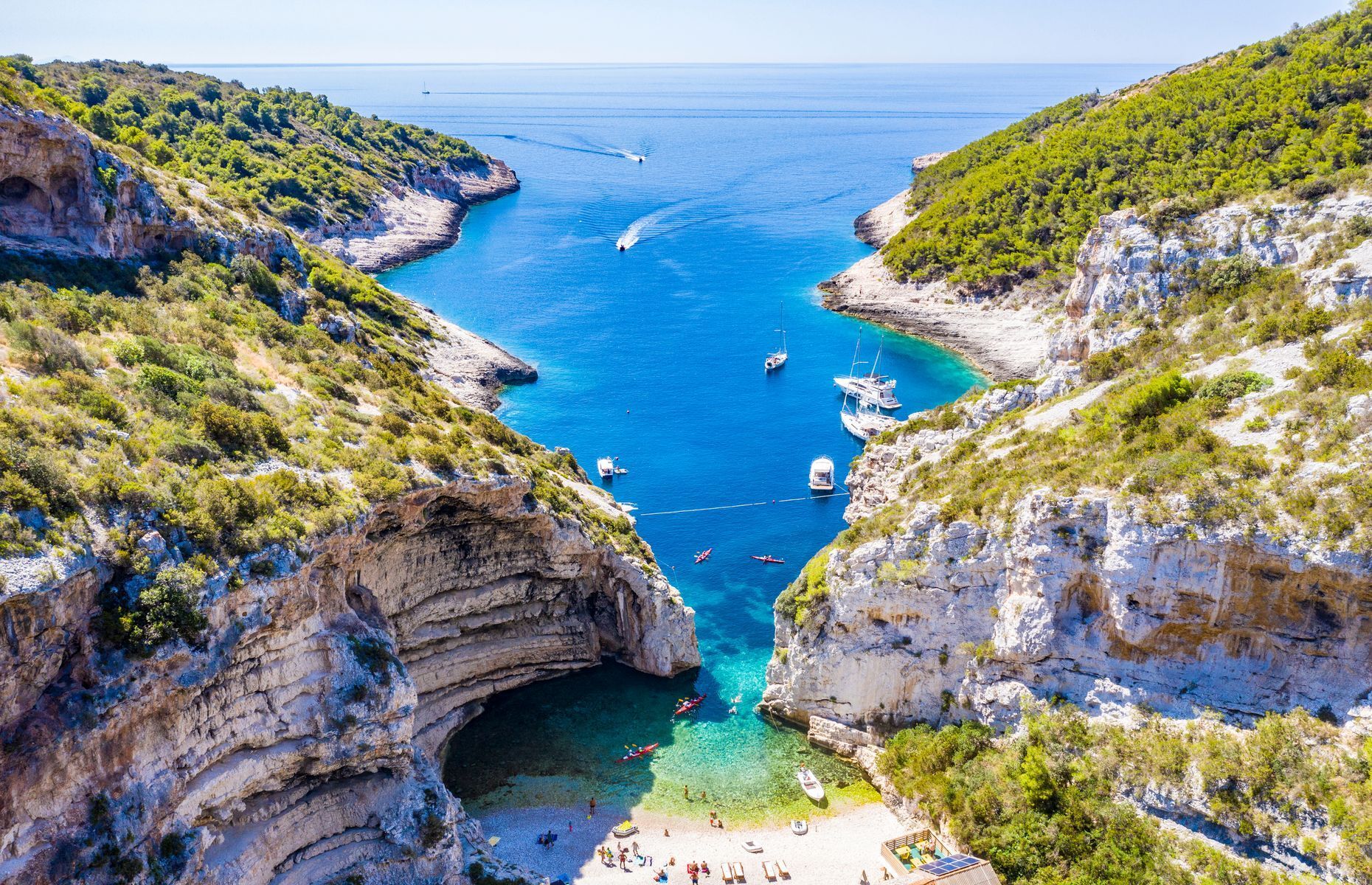 An untouched pearl of the Adriatic, the island of <a href="https://travelmelodies.com/the-island-of-vis-in-croatia/" rel="noreferrer noopener">Vis</a> boasts heavenly beaches, such as Stiniva and Srebrna, as well as renowned vineyards. This magical place is also perfect for diving, kayaking, and even exploring underwater caves and shipwrecks. A visit to the archaeological museum and old-town ruins will delight culture buffs.