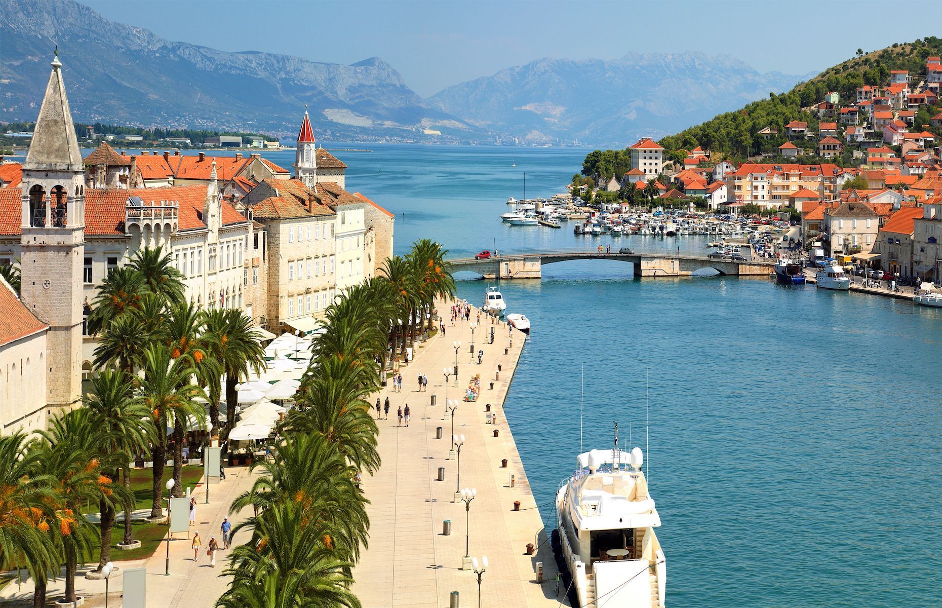 Less than 30 kilometres (18 miles) from Split, you’ll find the sublime town of <a href="https://www.earthtrekkers.com/beautiful-town-trogir-croatia-photos/" rel="noreferrer noopener">Trogir,</a> a treasure of the Dalmatian coast and one of the region’s most beautiful places to visit. In addition to seeing its magnificent medieval districts, a UNESCO World Heritage Site, tour Venetian palaces and the 13th-century St. Lawrence Cathedral. Packed with excellent seaside restaurants offering the very best in traditional Dalmatian cuisine, Trogir is also the perfect foodie destination.