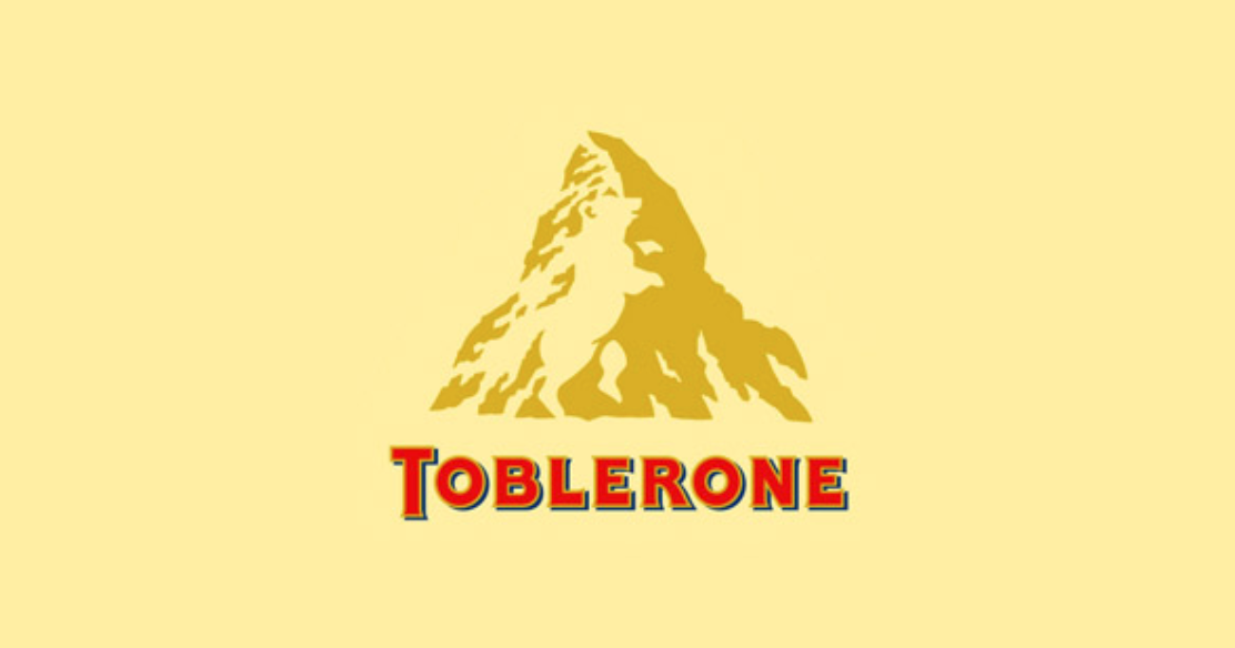 Логотип расшифровка. Тоблерон логотип. Toblerone медведь. Логотип с расшифровкой. Логотипы со скрытым смыслом