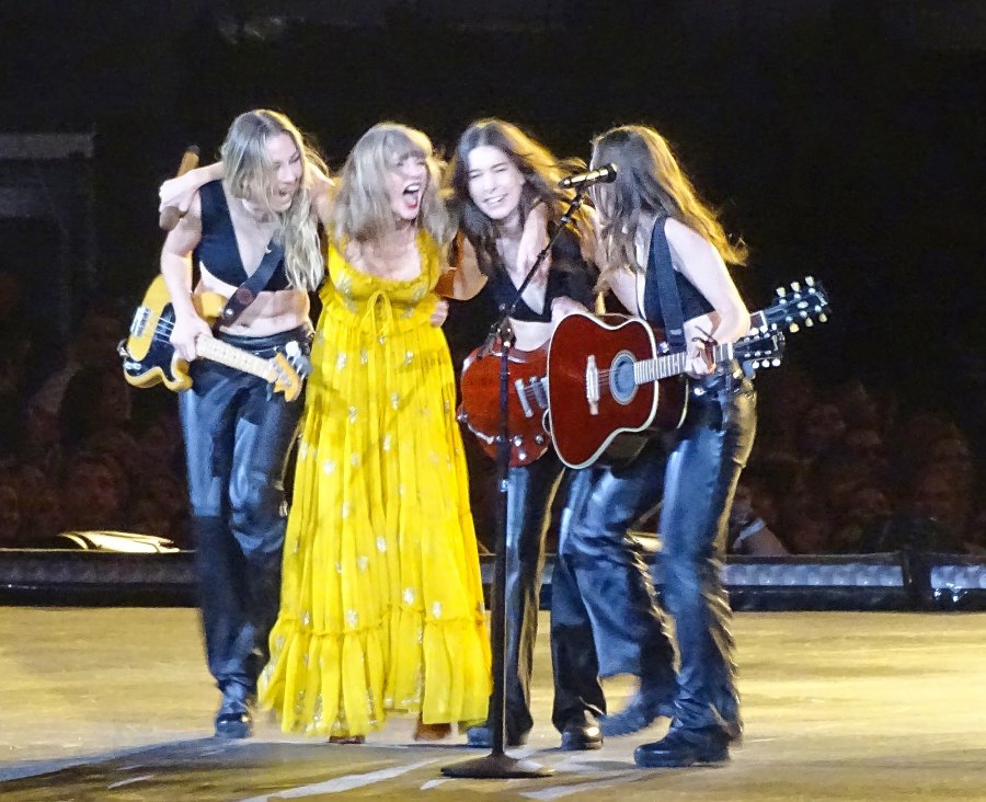 <p>Swift stunned in a marigold dress while performing with Haim during the final Los Angeles concert on August 9.</p>