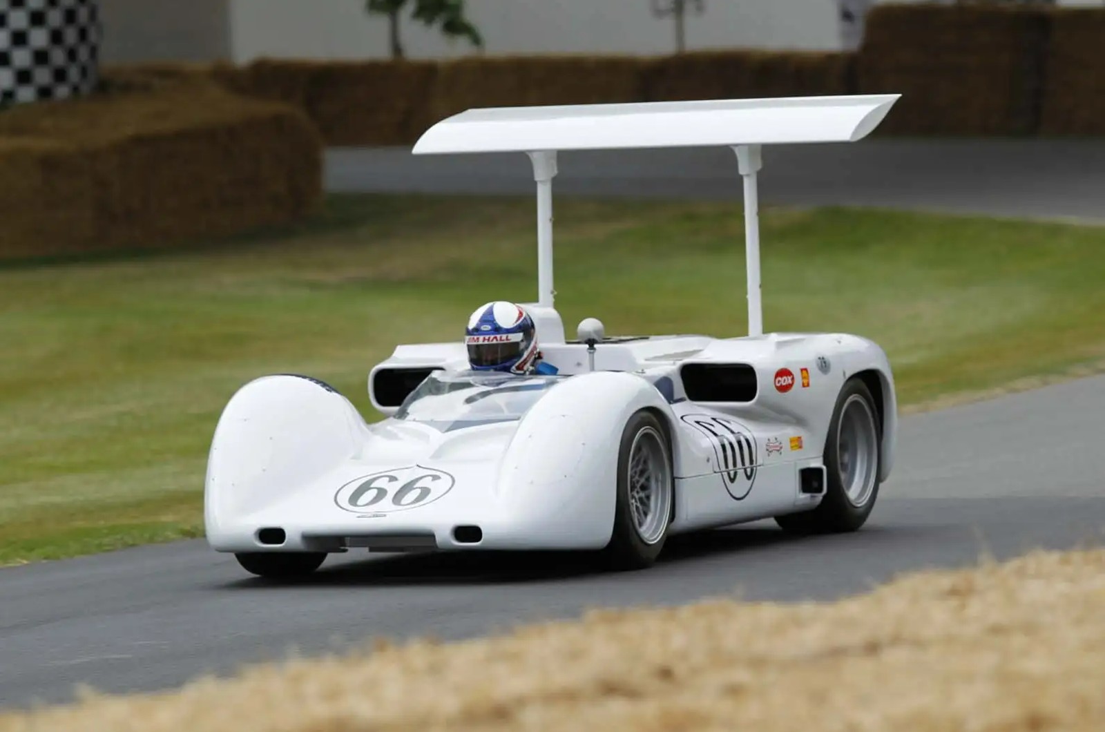 <p>Perhaps the most interesting of the “2” series Chaparral prototypes, the 2E introduced advanced aerodynamic principles to racing in 1966. Its innovative design included an elevated variable-incidence wing that could be adjusted for drag reduction or maximum downforce, providing superior cornering and control.</p><p>Although it achieved only one win at the 1966 Laguna Seca Raceway Can-Am, its performance was deceptive, as it led in several races. However, the 2E’s contributions extend far beyond any success in racing, as its pioneering aerodynamic design and heavy focus on generating downforce has hugely influenced subsequent race car design.</p>