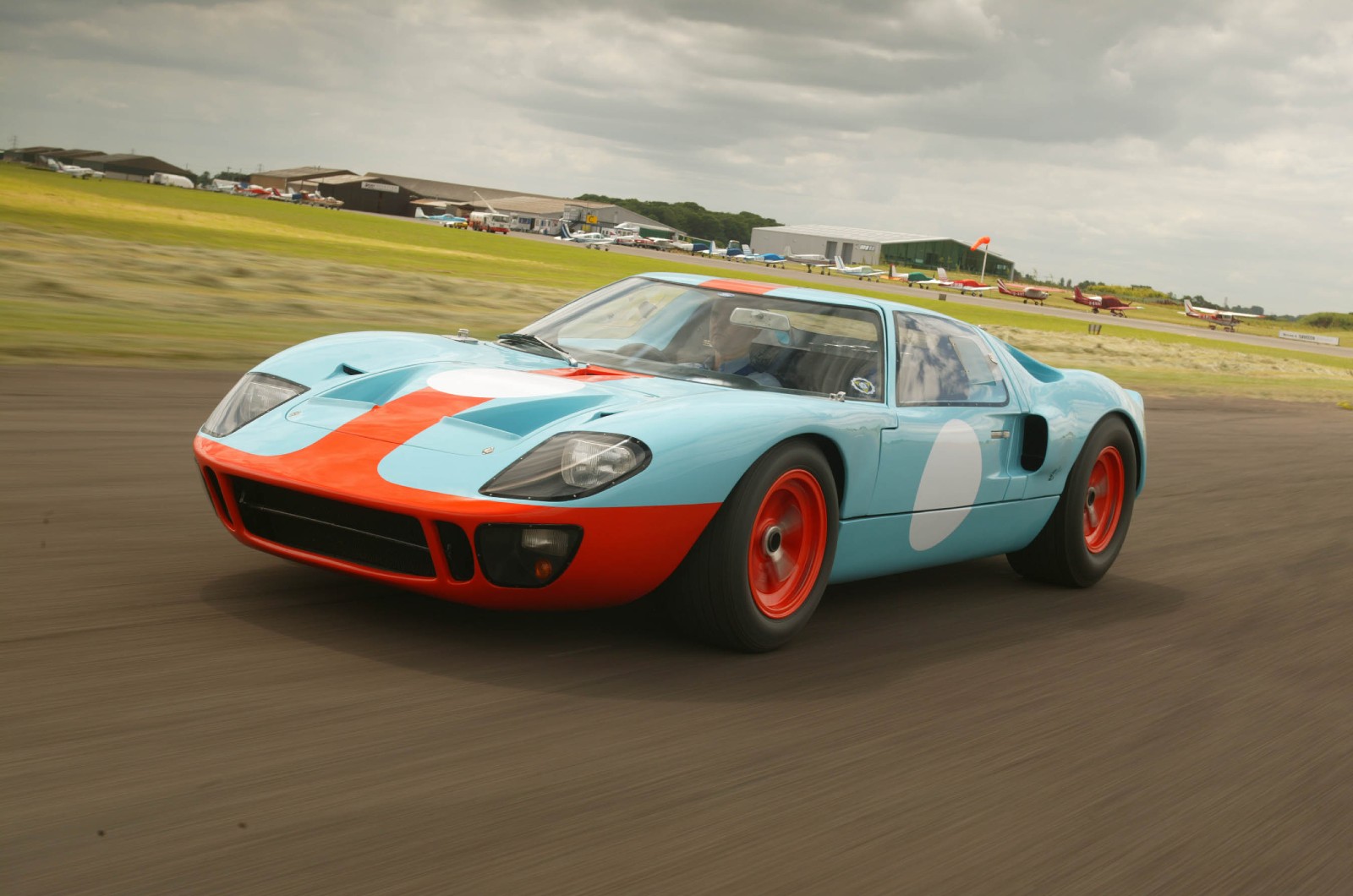 <p>The origins of the GT40 are about as legendary as the car itself. Born out of the most infamous grudge in motoring history, development of the GT40 began after failed negotiations by Ford to purchase Ferrari.</p><p>Powered by a Ford Fairlane-sourced 4.2-liter V8 aluminum block engine, the GT40’s groundbreaking design also included an advanced suspension system calibrated through early computer programming, which was unheard of at the time. In the end, Ford was successful in breaking Ferrari’s dominance in endurance racing. The GT40 achieved a remarkable four year winning streak at the 24 Hours of Le Mans from 1966 to 1969, demonstrating the capacity of American automakers to produce high-performance, championship-winning sports cars.</p>