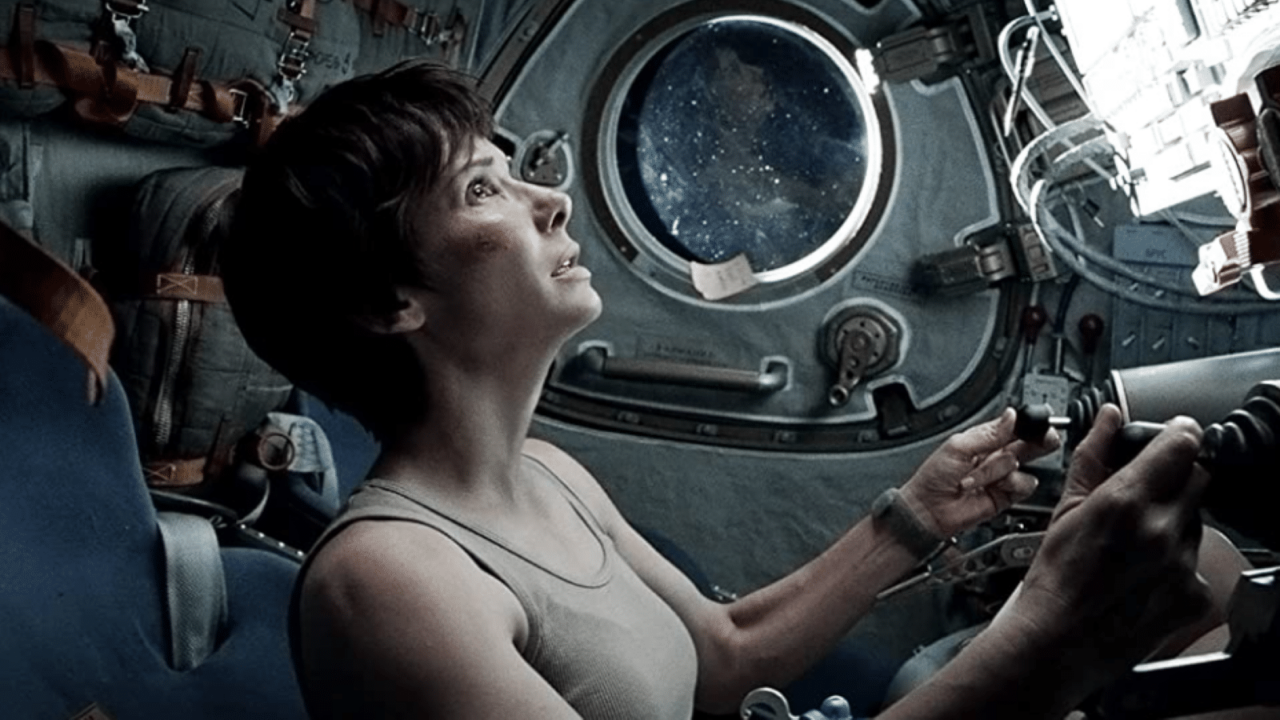 <p>Alfonso Cuarón’s mesmerizing film follows astronaut Ryan Stone’s (Sandra Bullock) journey to return home safely. After a spacewalk goes wrong, her mission partner Matt (George Clooney) is lost. She is left stranded in space, cut off from Mission Control communications. And her only chance is survival is to reach another space station with the little fuel she has left. </p><p><em>Gravity</em> explores isolation, mortality, and the strength of the human spirit with gravitas thanks to Bullock’s expressive performance. Not much is said, but we deeply feel every intense and solemn moment.</p>