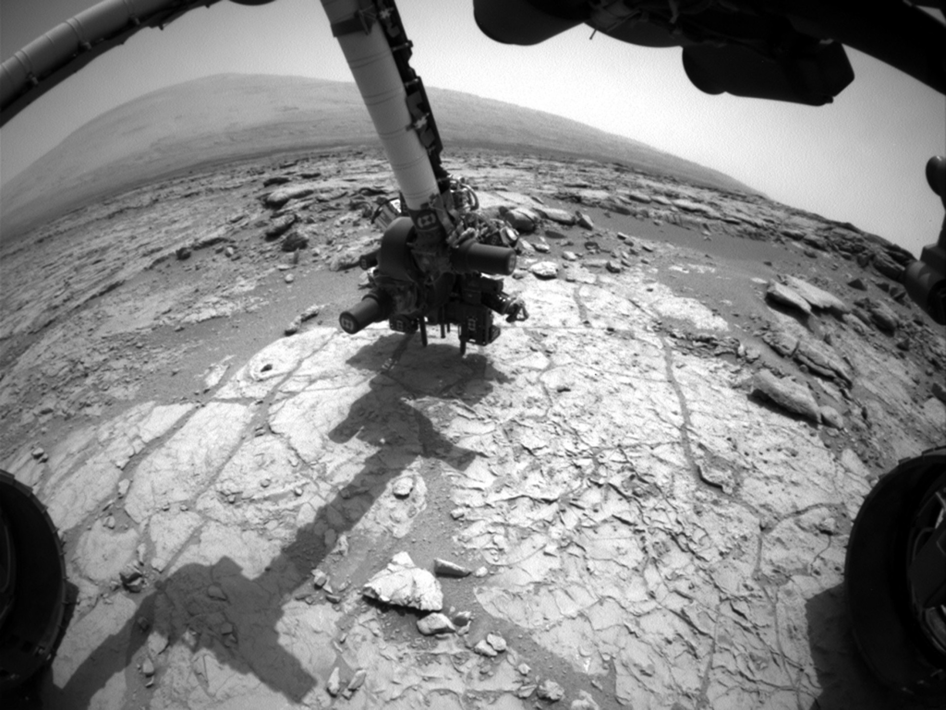 Esta é a broca de percussão no final do Curiosity Robotic Arm, que estava fazendo contato com a superfície rochosa em 27 de janeiro de 2013.