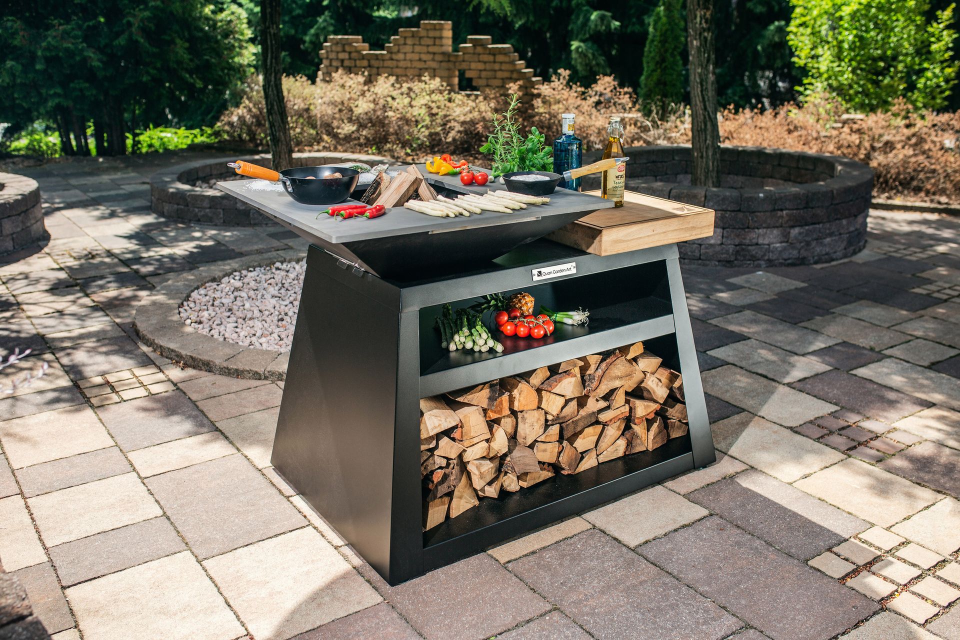 <p>                     If you're feeding a crowd, BBQs will make easy work of it. This style shown here has a large fire pit at the center and a tempered steel top plate for fast cooking Teppanyaki style food. And, it has a side table for easy prepping and a storage shelf below for barbecue tools and marinades, so you can keep everything you need on hand.                   </p>                                      <p>                     Another plus is that less smoke is produced as the base has been designed to direct airflow. Keep the fire stoked once the barbecue's over and everyone can keep partying till late.                   </p>