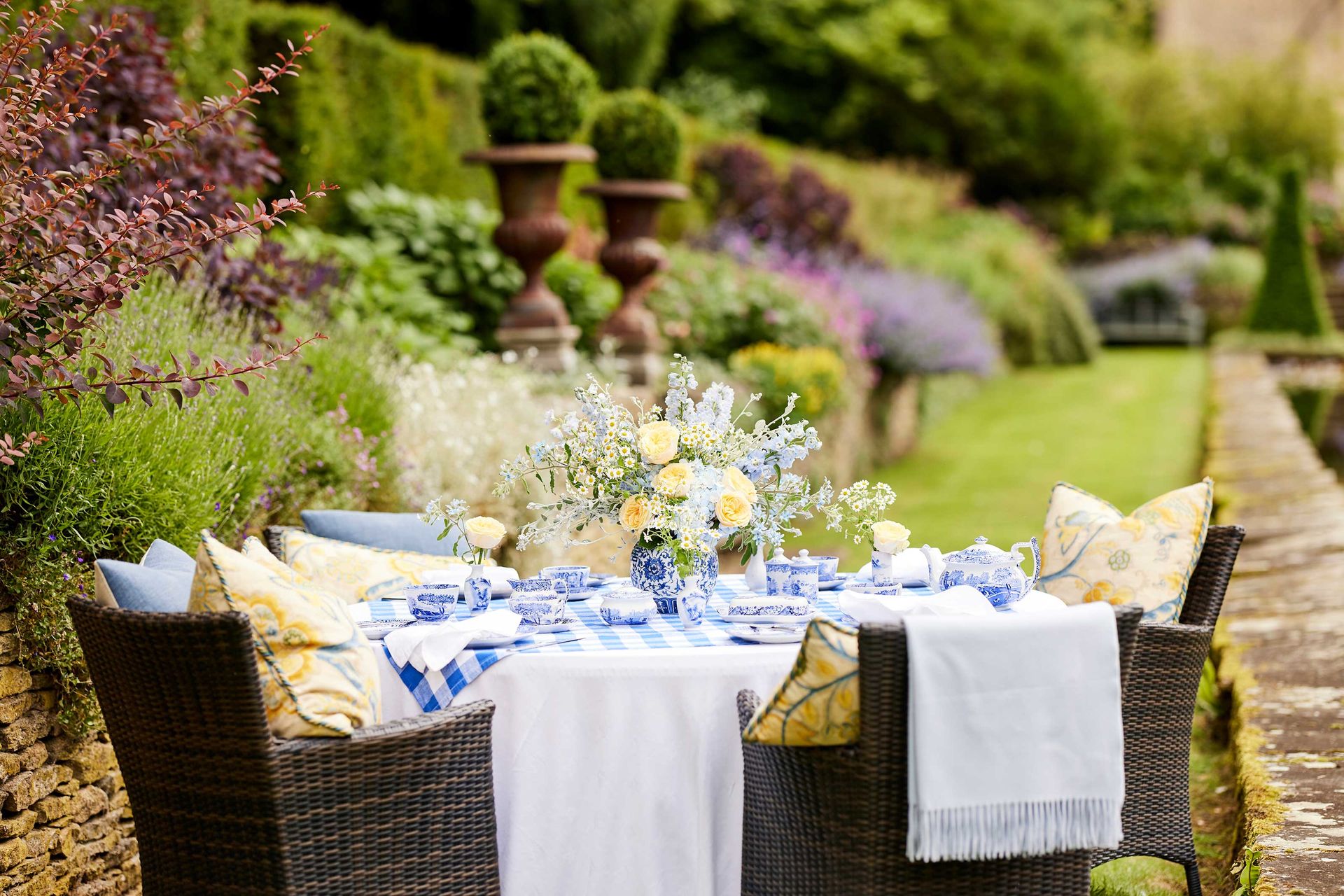 <p>                     Picking a few complementary tones is a great way to theme your garden party ideas. A well-considered palette can totally transform a space.                   </p>                                      <p>                     Take this blue and yellow duo for instance – a wonderful combination for a summery bash. We especially love the combination of yellow roses and blue delphiniums alongside the traditional china.                   </p>                                      <p>                     Don't forget about napkins too. They're an easy yet elegant way to help dress the table, especially if you opt for fabric types with napkin rings. 'The prettiest silver rings can easily be found in antique shops or on online auction sites. Alternatively, tie the napkins with a ribbon and finish off the look with a little flower head slotted in,' says Paul Thomas-Jeffreys, Founder and Creative Director of Paul Thomas.                   </p>