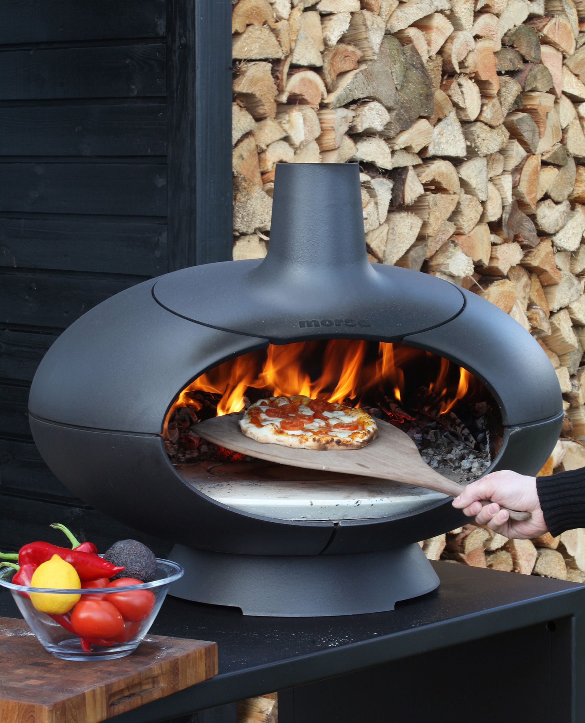 <p>                     It's easy to recreate that authentic wood-fired taste with a pizza oven. This smart design above can also be used for grilling steaks and smoking food.                   </p>                                      <p>                     But, if you don't fancy doing it yourself, take a look at hiring a pizza oven for the weekend – you could even hire a chef for the evening, too.                   </p>