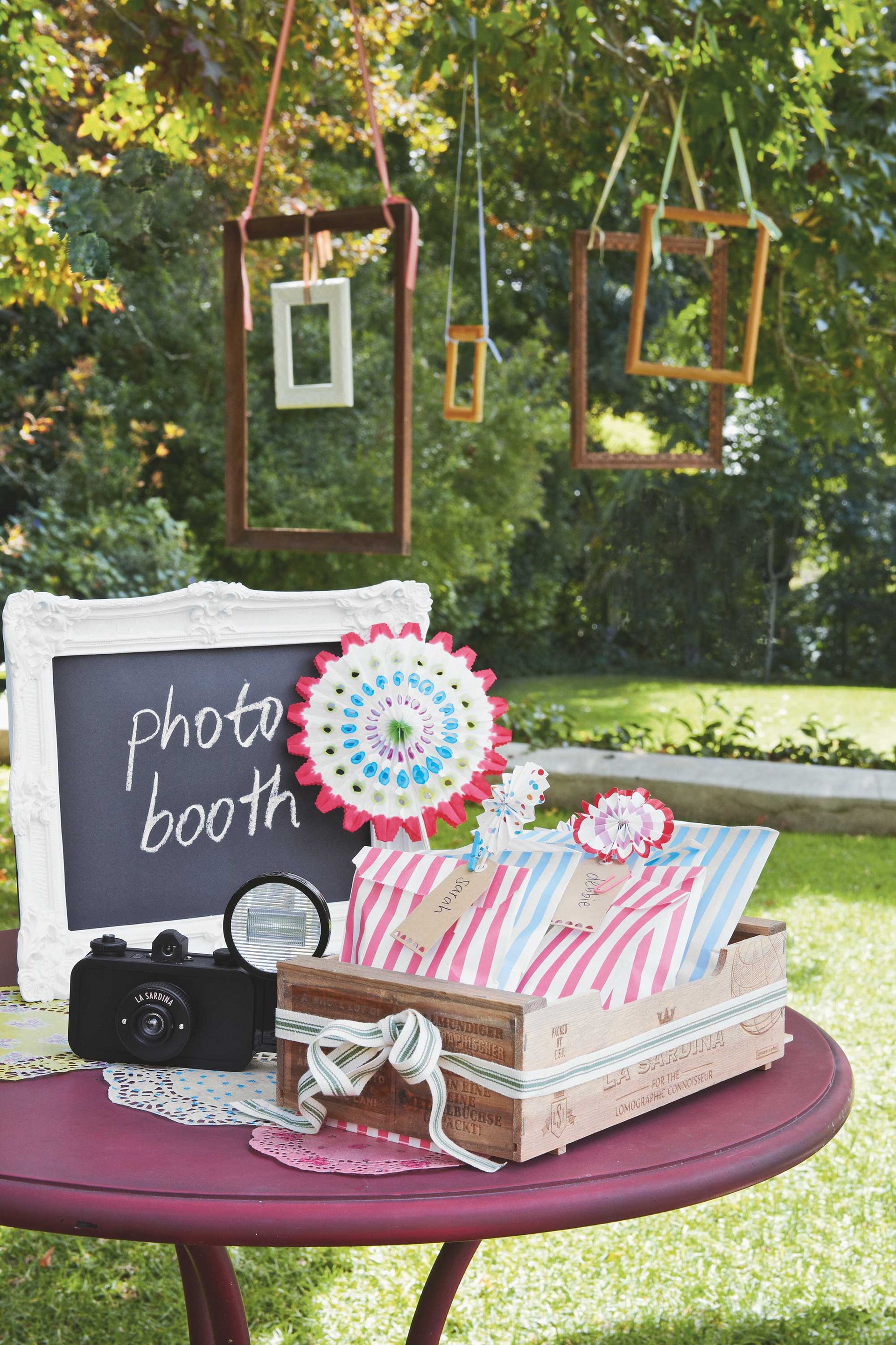 <p>                     From selfies to group shots – you can be sure that they'll be a camera or two floating around at your next garden bash. So why not embrace it and help those memories last forever with a dedicated photo zone?                   </p>                                      <p>                     You could hang thrifted frames from tree branches, or create a stylish backdrop with an old decorated sheet (or even go for an on-trend flower wall if you're looking for something a little fancier).                   </p>                                      <p>                     And how about setting up a dress-up trunk nearby, full of hats, sunglasses, and other fun props? Position a handful of disposable cameras on a small table ready to be used. Then, you can enjoy the element of surprise when you develop them at a later date – the pictures will be priceless.                   </p>