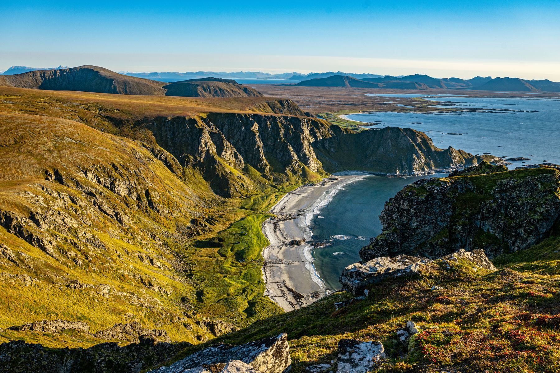 Sandy beaches, magnificent cliffs, and lush green pastures make <a href="https://www.visitnorway.com/places-to-go/northern-norway/vesteralen/andoya-scenic-route/?lang=usa" rel="noreferrer noopener">Andøya Island</a> one of Norway’s most undeniably magical places to explore. Located at the northern tip of the Vesterålen archipelago, this island boasts an abundant marine life, offering visitors the chance to see whales, orcas, and seabirds in their natural habitat. Whether drawn by Andøya’s idyllic setting or peaceful ambiance, travellers should shoot for between May and August to enjoy its pleasant climate and outdoor activities.
