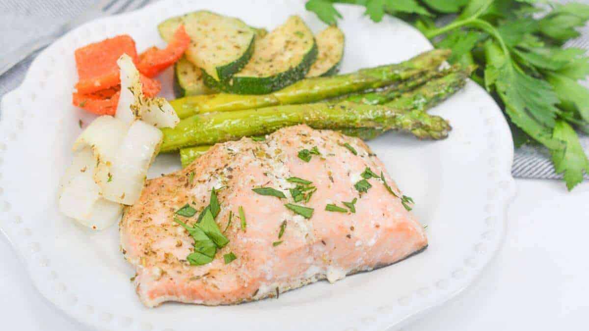 <p>Toss salmon and veggies onto a sheet pan, pop it in the oven, and voilà—your dinner is ready with minimal fuss, showing that a balanced and delicious meal is just a few simple steps away, even on your busiest days.<br><strong>Get the Recipe: </strong><a href="https://littlebitrecipes.com/sheet-pan-salmon/?utm_source=msn&utm_medium=page&utm_campaign=msn">Sheet Pan Salmon and Vegetables</a></p>