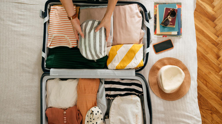 The Simple Packing Hack That Will Keep Your Luggage From Tipping Over