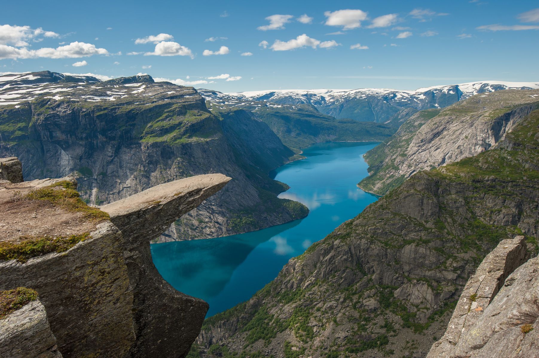 <a href="https://www.visitnorway.com/places-to-go/fjord-norway/the-hardangerfjord-region/hiking-to-trolltunga/?lang=usa" rel="noreferrer noopener">Trolltunga</a> is an iconic natural wonder that draws intrepid travellers from all over the world to Norway. Impressive rock formations overlooking Lake Ringedalsvatnet and the surrounding mountains are the stuff of dreams for many an adventurer. Weather conditions, however, can make reaching this enchanting site somewhat dangerous, so the presence of a guide is strongly recommended and even compulsory between October 1 and May 31. Some preparation is also suggested as this 27-kilometre (17-mile) hike usually takes between 10 and 12 hours to complete.