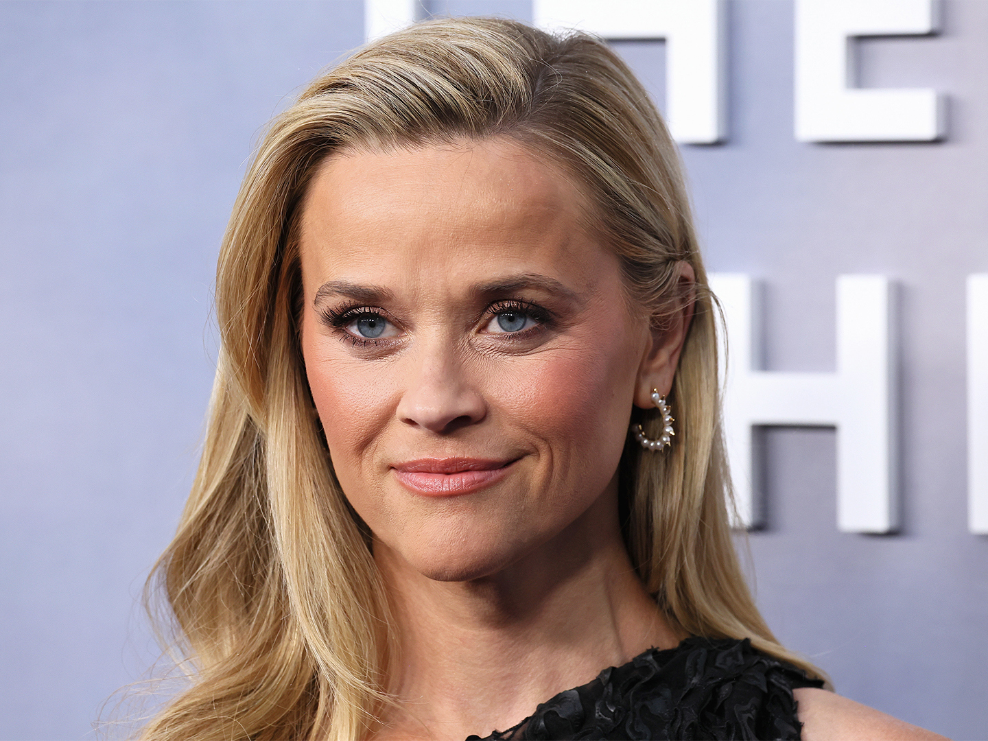 Reese Witherspoon Swears By These Super Affordable Sneakers–& You