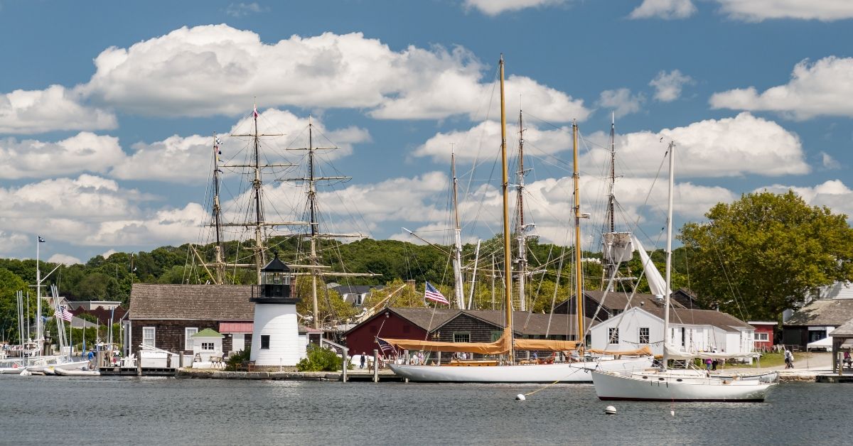 <p>  This 18th-century maritime settlement is known for more than being the location for the 1988 Julia Roberts' film  <em>  Mystic Pizza  </em>  . </p> <p>  The Mystic Seaport is a top attraction for the entire state, offering tours of historic ships and homes, quaint shops, and top seafood restaurants. Every August, tens of thousands of visitors gather for the Mystic Outdoor Art Festival. </p>