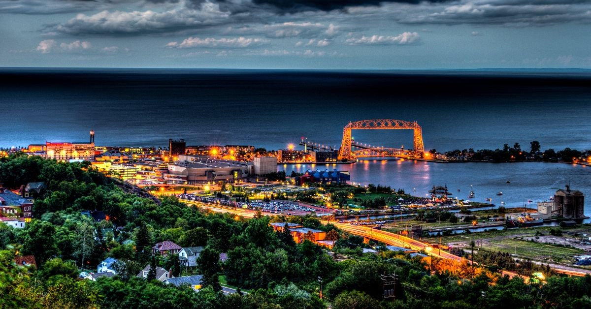 <p>  Nestled up against Lake Superior, the city of Duluth is a port city gushing with tons of fun things to do, from aquariums and theaters to plane and harbor cruises. </p> <p>  Overlooking the lake, Canal Park is Duluth’s hotspot for dining, entertainment, and attractions. Wake up to a view at South Pier Inn or make your way down to watch 1,000-feet ships pass under the Aerial Lift Bridge. </p>