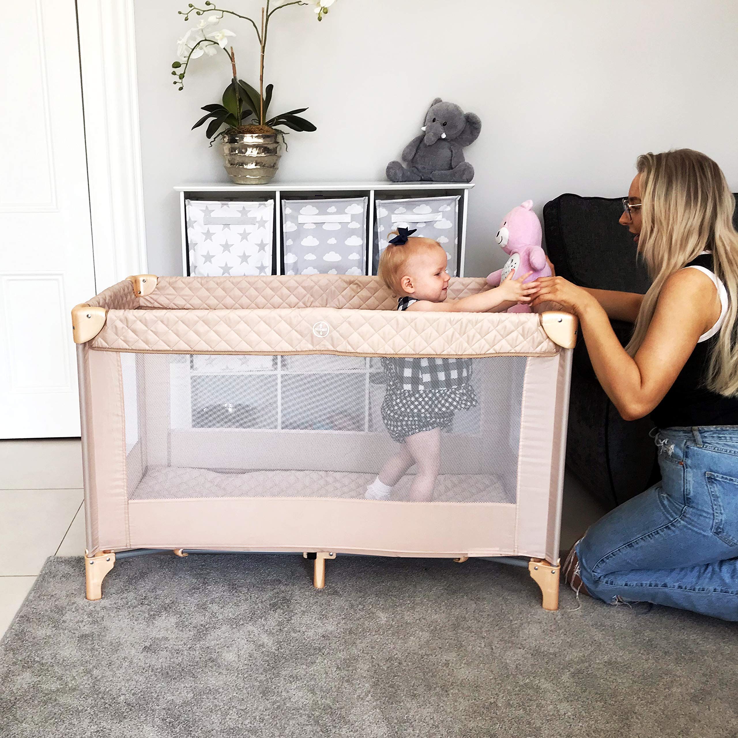 <p><strong>£59.99</strong></p><p><a href="https://www.amazon.co.uk/dp/B0852118JM">Shop Now</a></p><p>At under £60, this blush travel cot from on-trend baby brand <a href="https://mybabiie.com/">My Babiie</a> is a great budget-friendly neutral option. It’s easy to assemble and doubles up as a playpen making it the ideal travel companion. This stylish travel cot also comes with a handy carry bag and padded bumper rails, plus it’s suitable for babies from birth up to a weight of 15kg. </p>