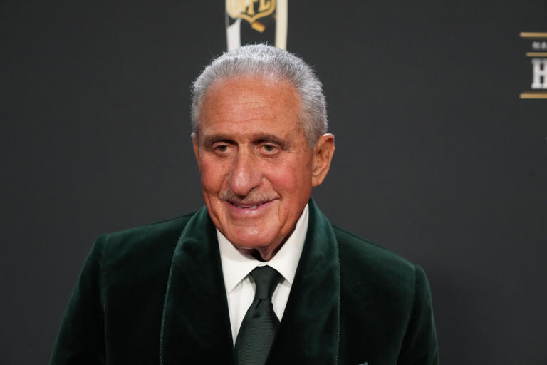 Arthur Blank poses for a photo on the red carpet before the NFL Honors award show at Symphony Hall.