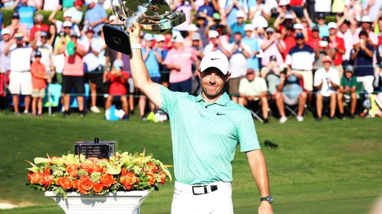 Rory McIlroy holds the FedExCup aloft in 2022.