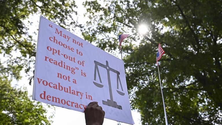 A group of Montgomery County parents gather outside MCPS Board of Education to protest a policy that doesnât allow students to opt-out of lessons on gender and LGBTQ+ issues during the school board meeting in Maryland, United States on July 20, 2023. Celal Gunes/Anadolu Agency via Getty Images